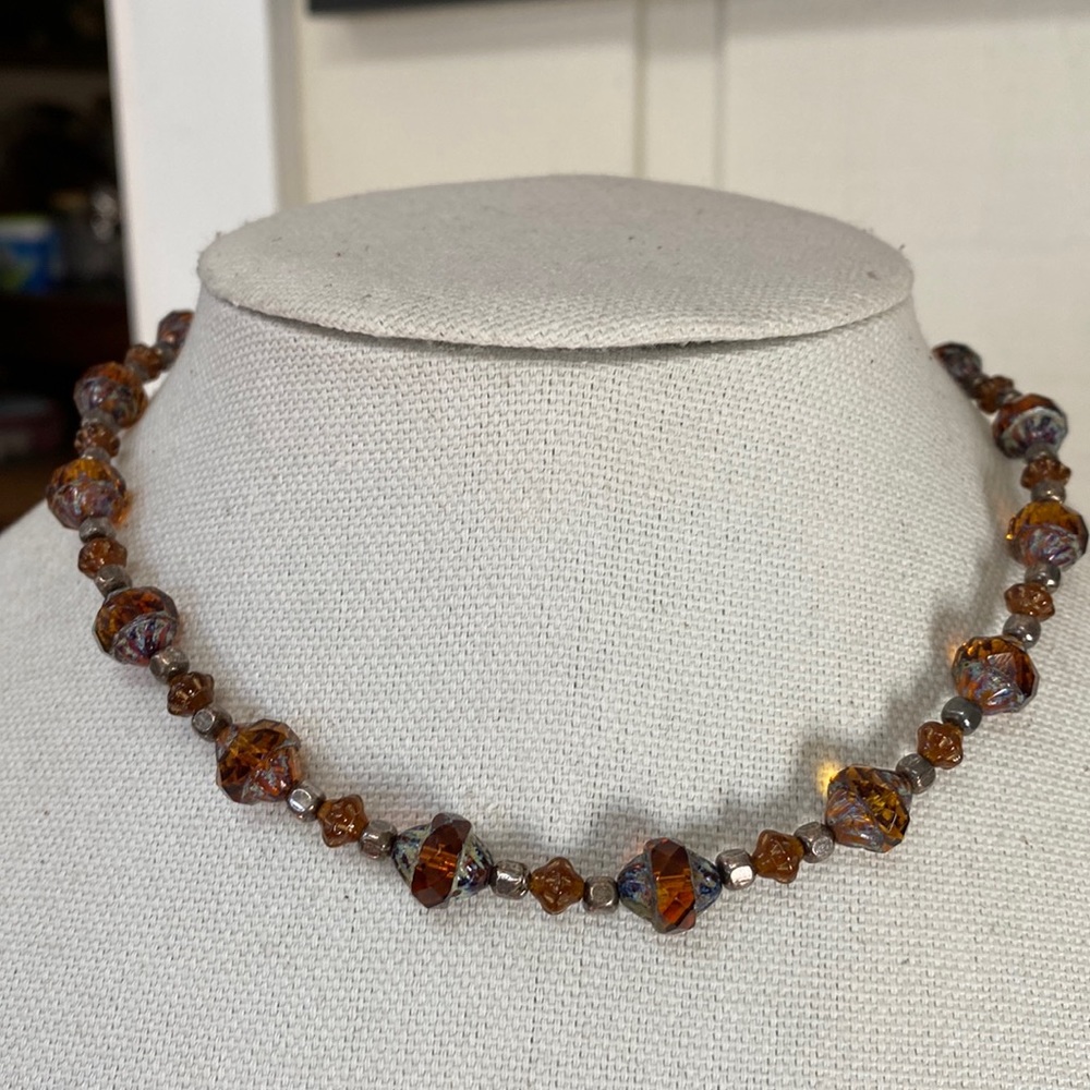 Petite sized amber colored bead necklace